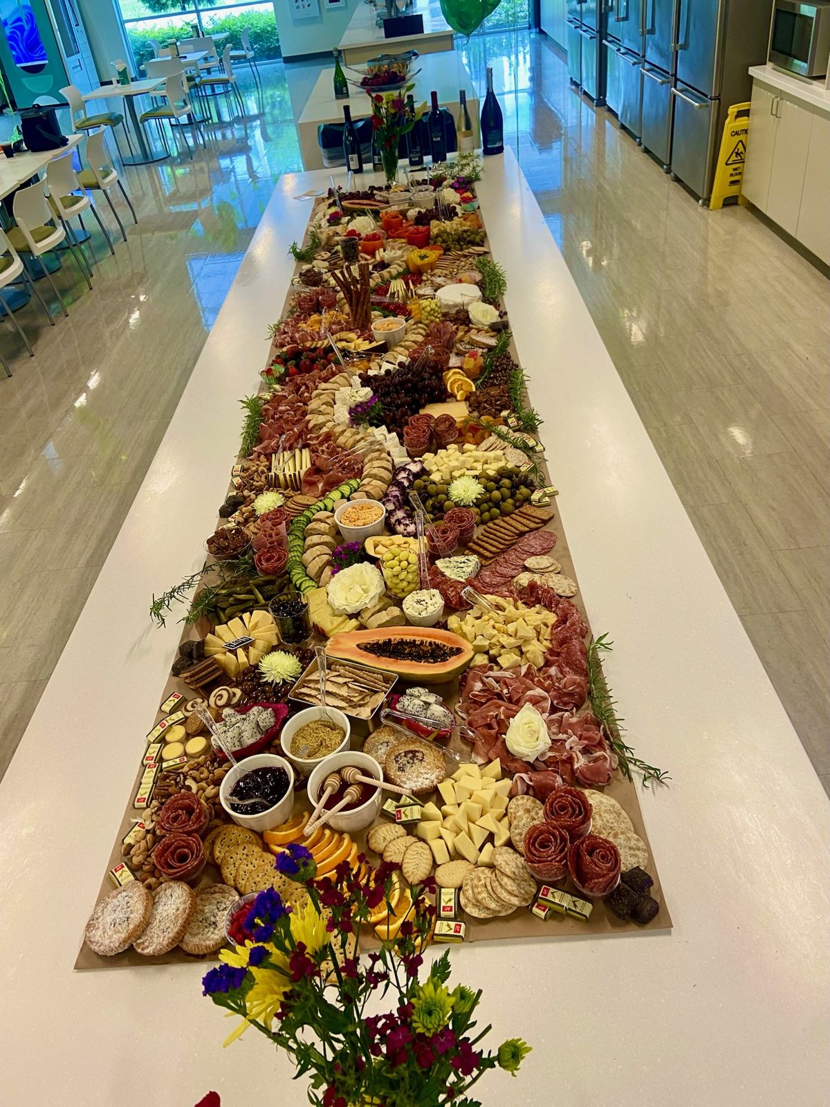 Extra-long grazing table styled for a corporate event