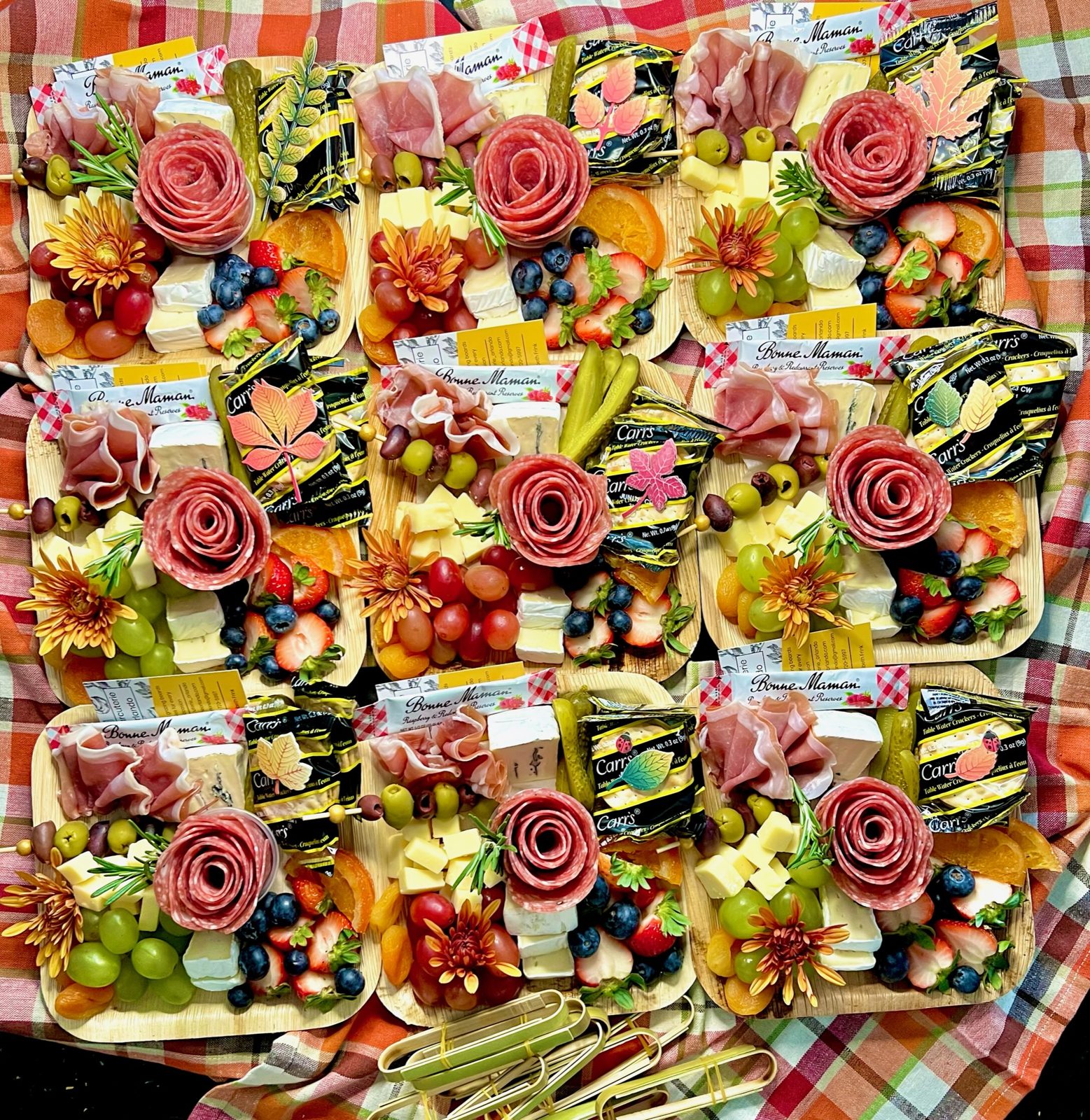 Rows of individual boards built during a charcuterie workshop